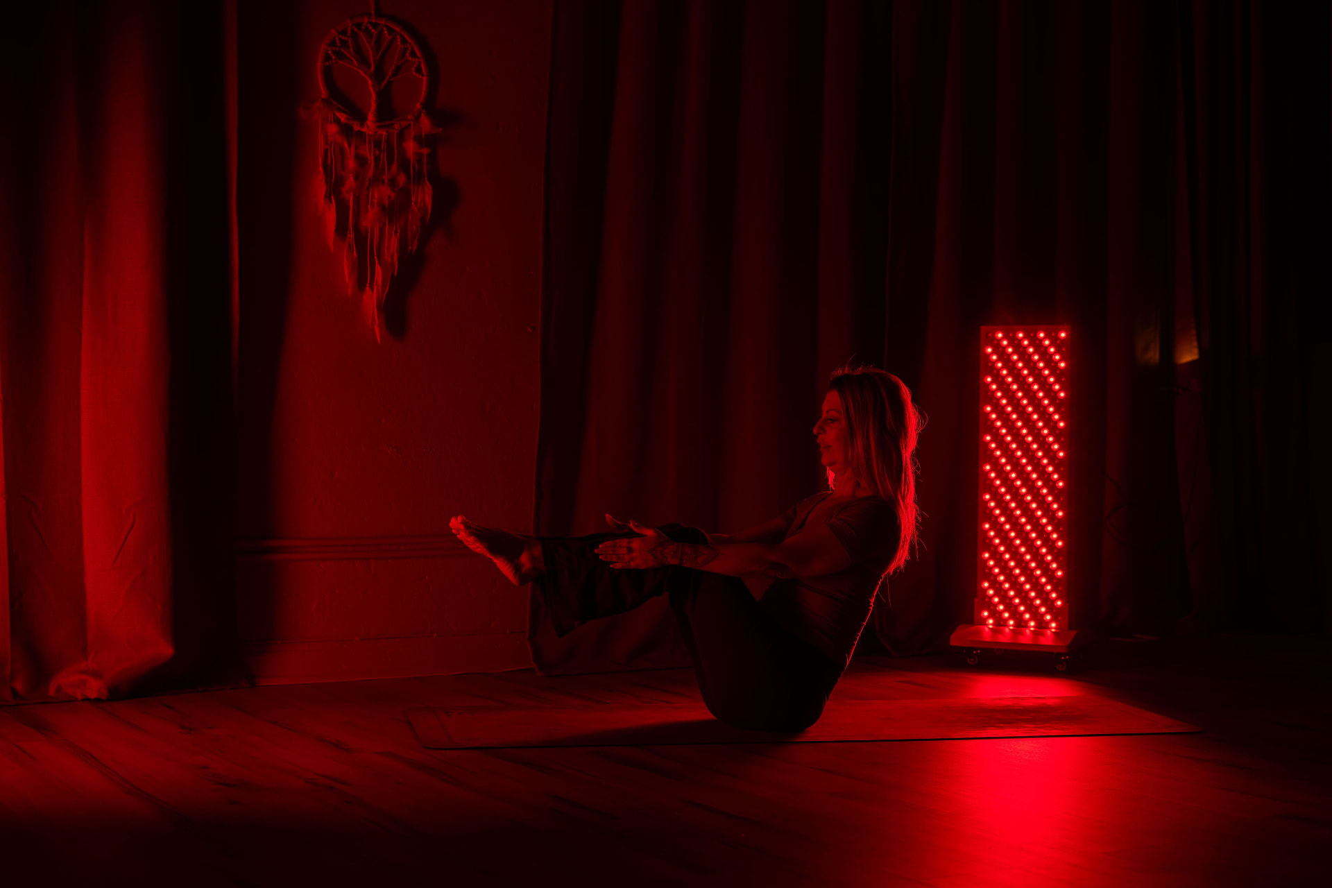 Träning med rödljusterapi hos NEST Innerhealth